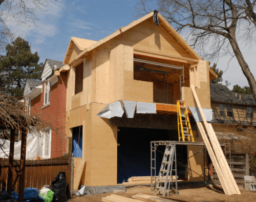 house being constructed with a new additions